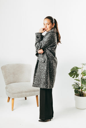 Long coat with decorative buttons on the sleeve