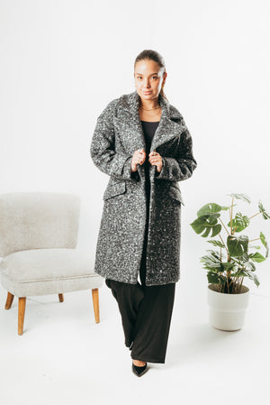 Long coat with decorative buttons on the sleeve
